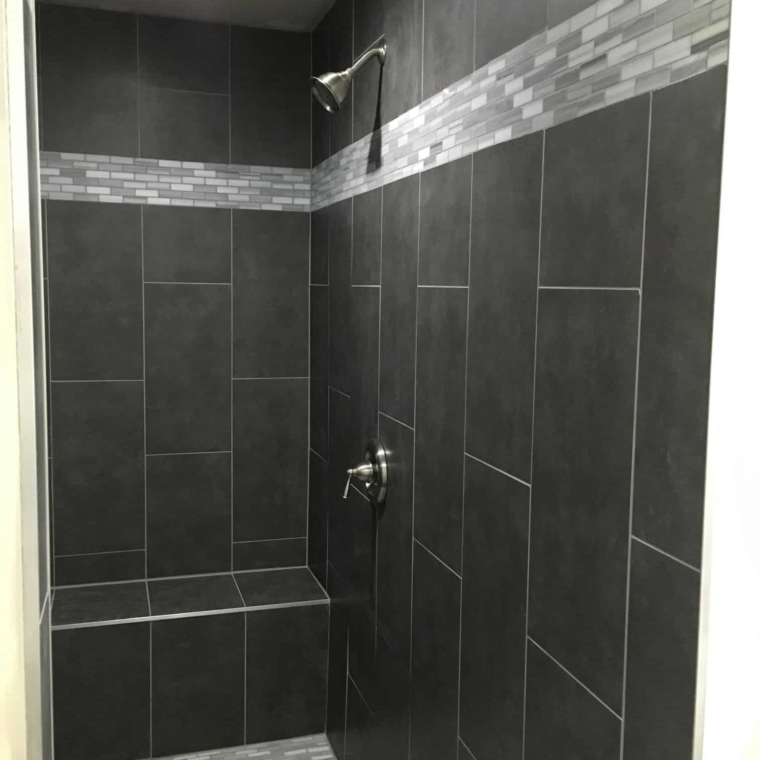 Beautiful dark tile shower